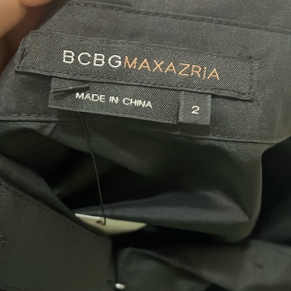 BCBGMaxAzria Black A-Line Peplum Dress with Puff Sleeves - Picture 4 of 16